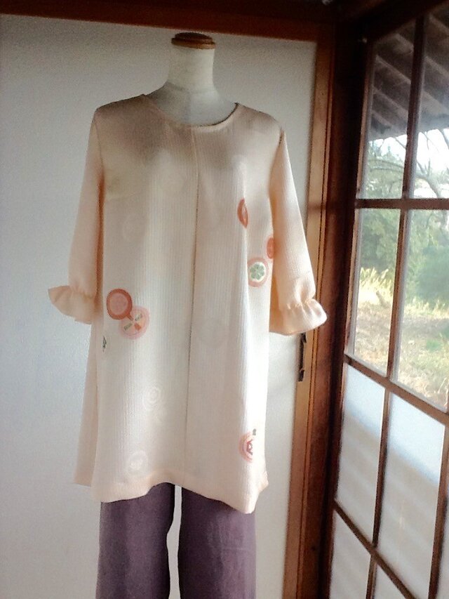 サーモンピンクのチュニック