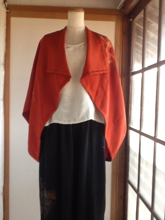 レンガ色の羽織物