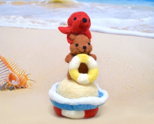 浮き輪コグマと仲良しタコちゃんの画像1枚目