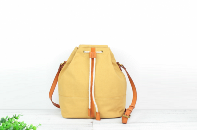 キャンバス+牛革 巾着式斜め掛けショルダーバッグ ♪Yellow♪の画像1枚目