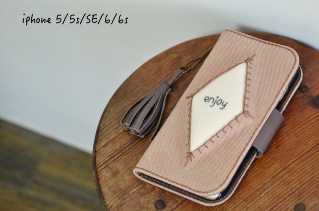 iPhone5,5s,SE,6,6s,7 アンティークピーチ 名入れ可 帆布×レザー ぷっくり手帳型ケースの画像1枚目