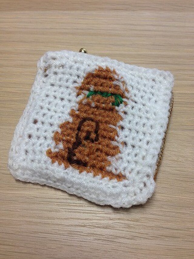 哀愁漂う犬の背中刺繍入りコインケースの画像1枚目