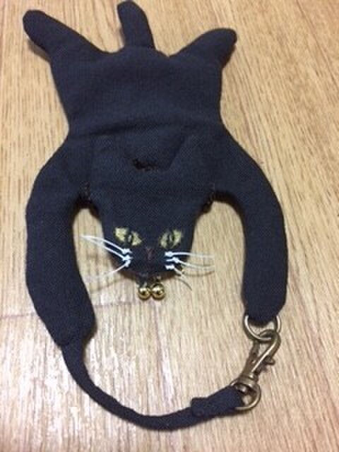 小さながま口の猫マスコット黒色の画像1枚目