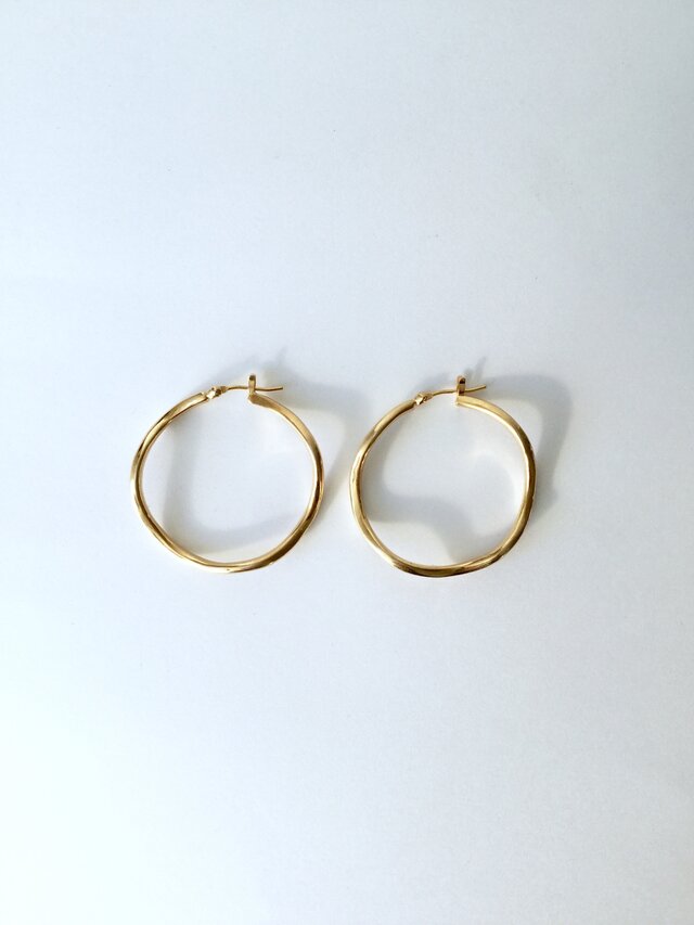 gentle hoop ピアス silver k18ygctの画像1枚目