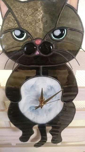 黒猫の振り時計-