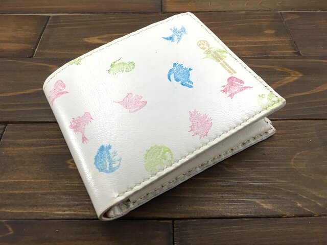 恐竜好き必見!可愛い恐竜スタンプのハーフウォレット(ゴートレザー)の画像1枚目