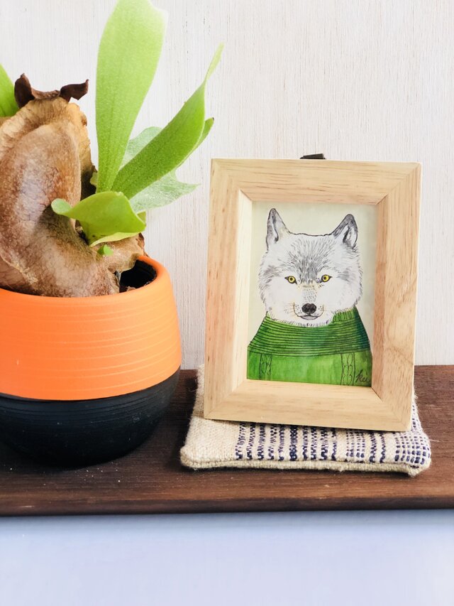 nit and wolf. グリーンのニットと狼。の画像1枚目