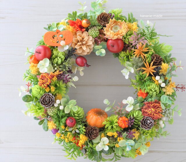 パンプキン＆木の実たくさんの　オレンジハロウィン造花リース ハロウィン オレンジ色のニゲラのリース：木の実 パンプキン