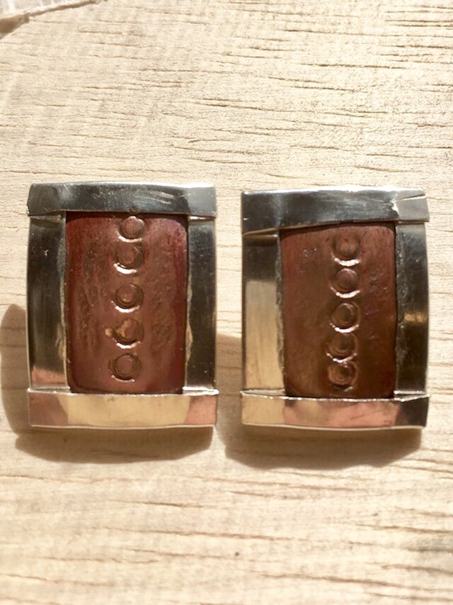 銀と銅のイヤリングの画像1枚目