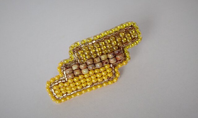 yellow broochの画像1枚目