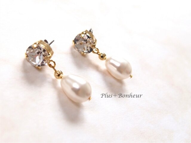 スワロフ◇スキーエレメントのクリスタルとパールのピアス◇ | iichi