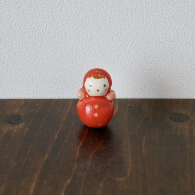 おきあがりこぼしのフェーブ(赤)の画像1枚目