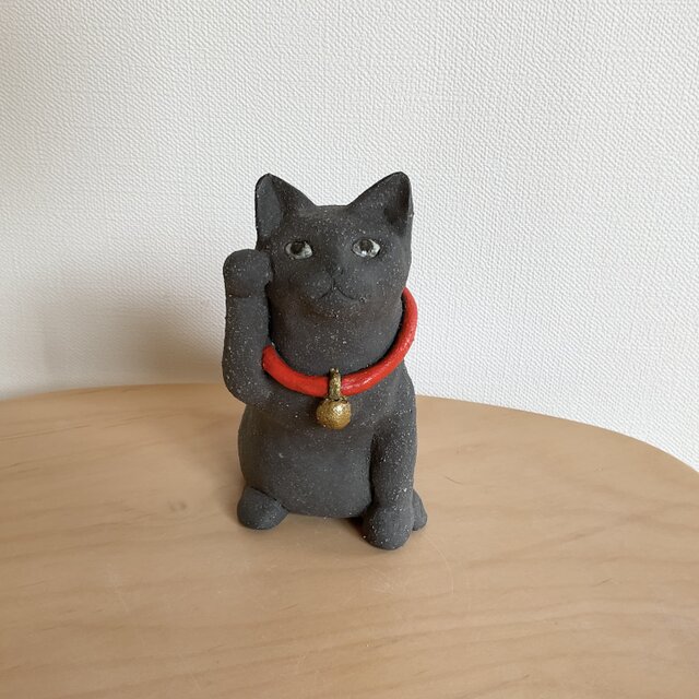 黒猫のまねき猫