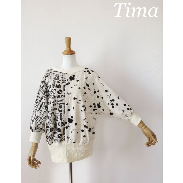 サインとドロップインク模様、アラン風リブのドルマンスウェット