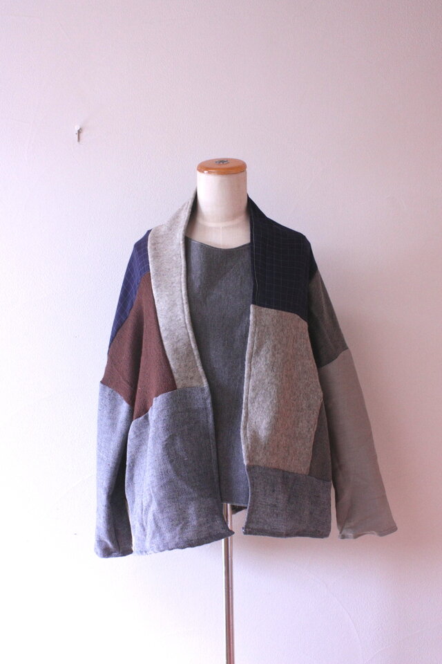 　冬のパッチのドロップショルダーカーデ