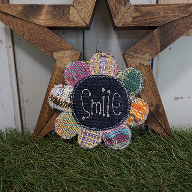 「smile」さをり織りフラワーコースターの画像1枚目
