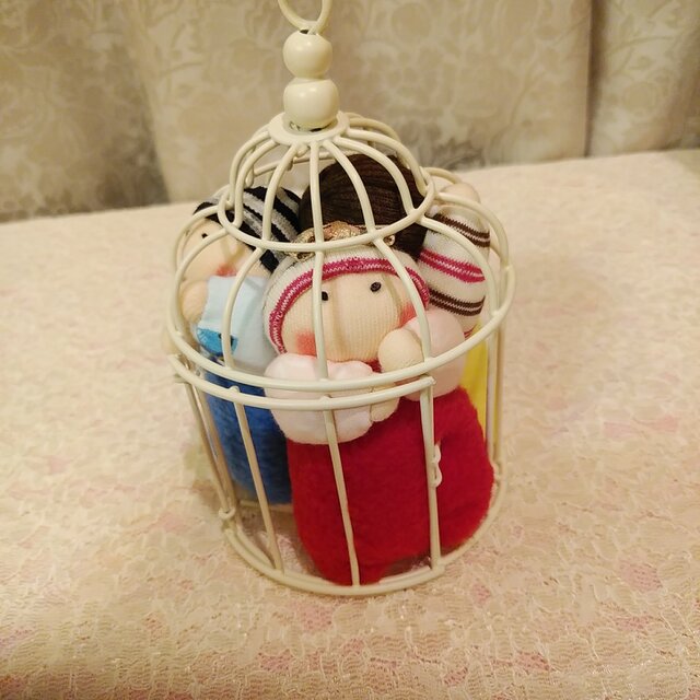 かごの赤ちゃん人形の画像1枚目