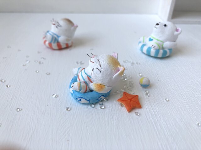 じょあんさん ねこの置物 浮き輪 じょあんさん ねこの置物 浮き輪 - メルカリ