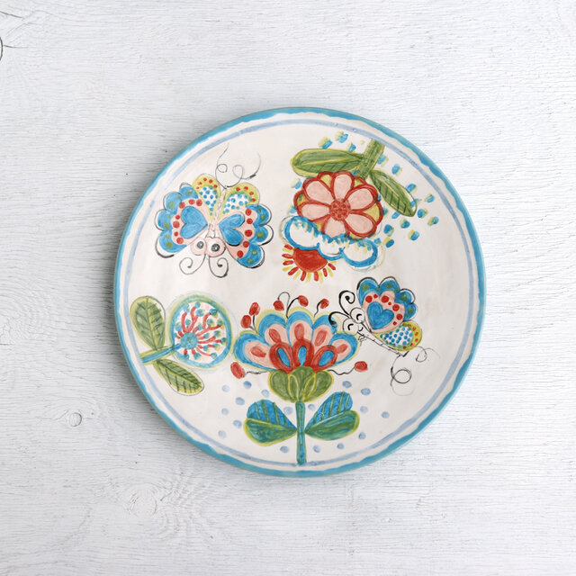 花と蝶絵の平皿(水色)の画像1枚目