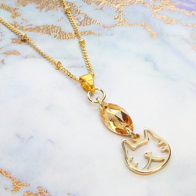 猫フェイスシルエットモチーフと大きめスワロフスキー（ゴールドシャドー）のネックレス ゴールドカラー