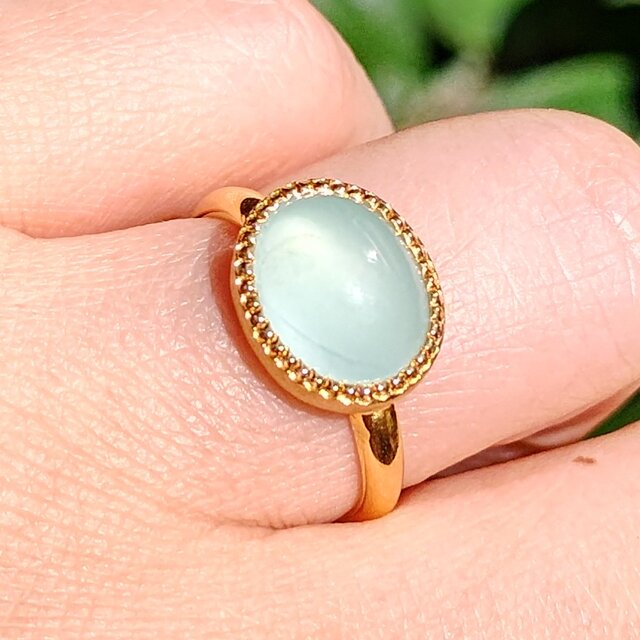 ミルキーアクアマリン オーバルカボション 3.37ct ミル打ち留め