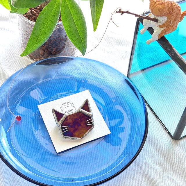 whisker brooch/ metallic bronze