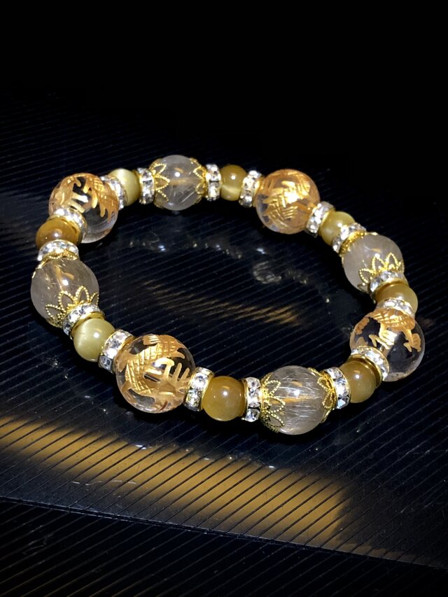 金色 龍彫り水晶 ルチルクォーツ 天然石ブレスレット | iichi