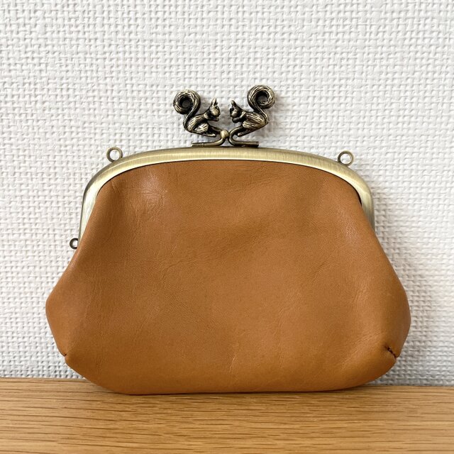 ぱかっと開くとお部屋が3つの親子がまぐち♪持ち手が付いた、くるりん