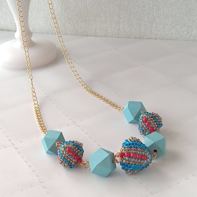 ターコイズカラーのポリゴンネックレス
