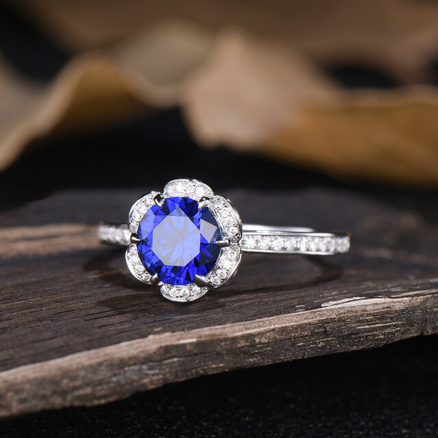 ユニークな 9 月の誕生石ブルーサファイア婚約指輪ハーフ