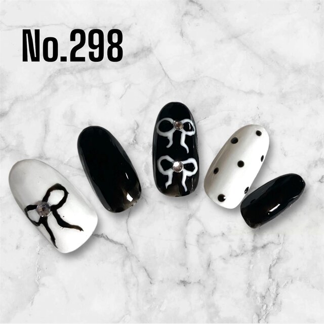 春夏にぴったり＊モノトーン×リボンの大人ガーリーネイルチップ