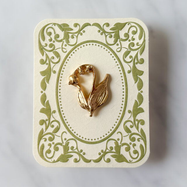 お*ん様 K18のブローチです。 スズランの日の贈りもの｜K18メッキの花咲くスズランのブローチ