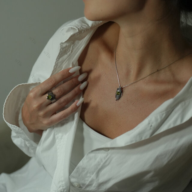 ハンドメイドのシルバーリング  Skalisto Half ペリドット