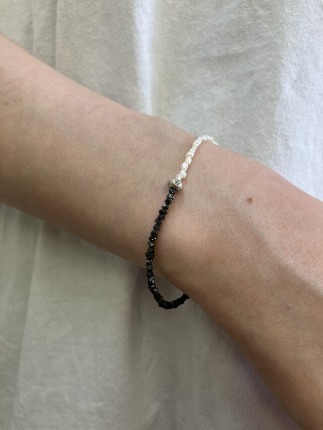 バイカラーのカレンシルバーブレスレット