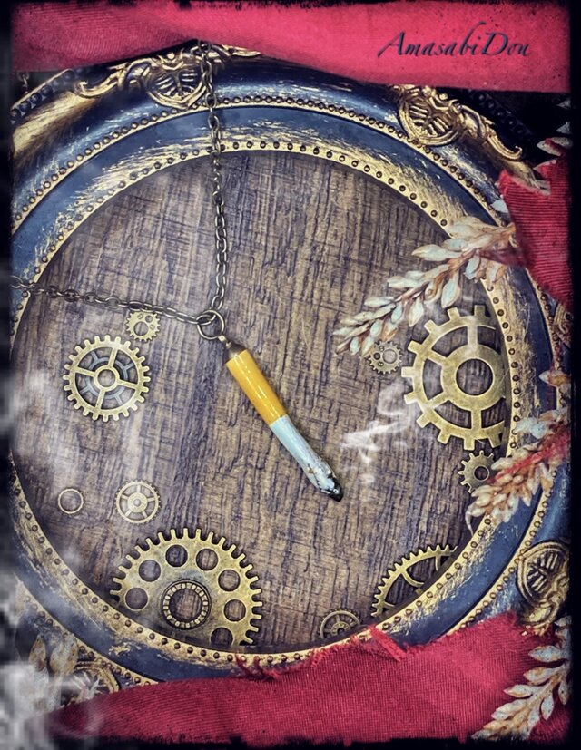 吸い殻のペンダント（金古美）