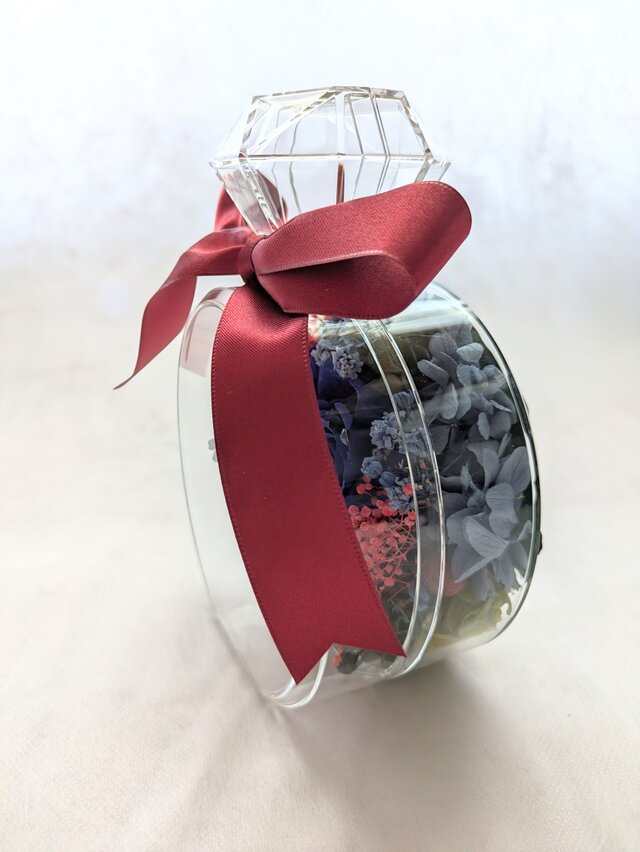 プリザーブドフラワー／青と赤の薔薇が混ざり合う魔法の香水瓶アレンジ