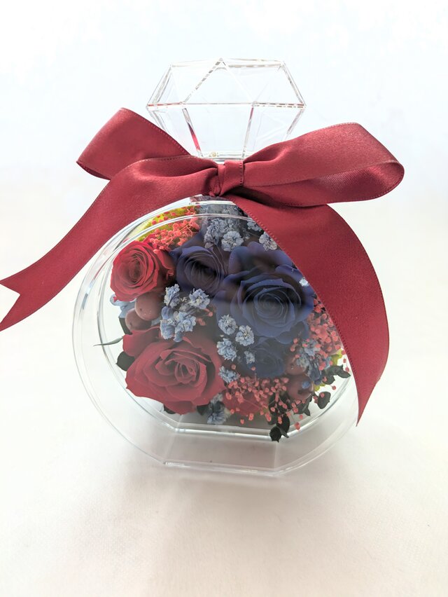プリザーブドフラワー／青と赤の薔薇が混ざり合う魔法の香水瓶アレンジ