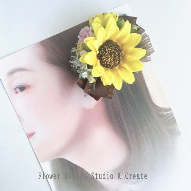 向日葵とピンクの薔薇のリボンヘアクリップ 　向日葵　おでかけ　浴衣　髪飾り　ヒマワリ　ひまわり　浴衣髪飾り　ブラウン　茶色　黄色