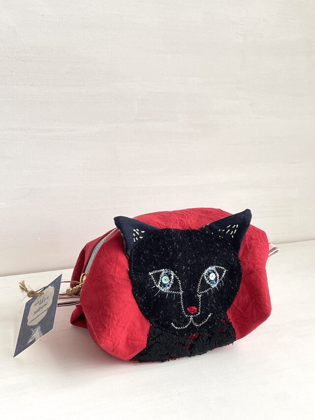 赤いお鼻の黒猫ポーチ