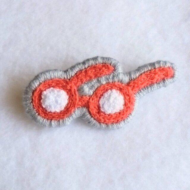 オレンジ色めがね　もこもこレンズの刺繍ブロー