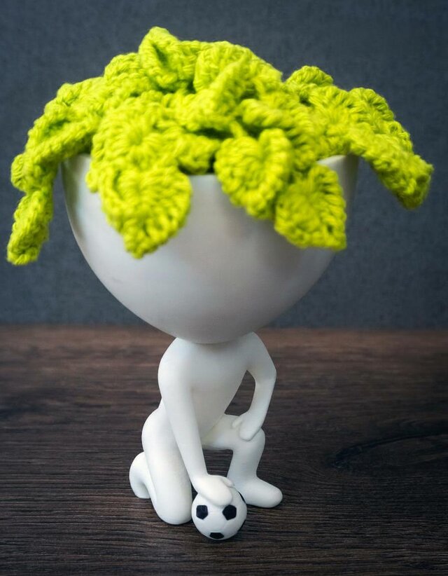 ロバート・プラント サッカー選手 - しゃがみポーズ