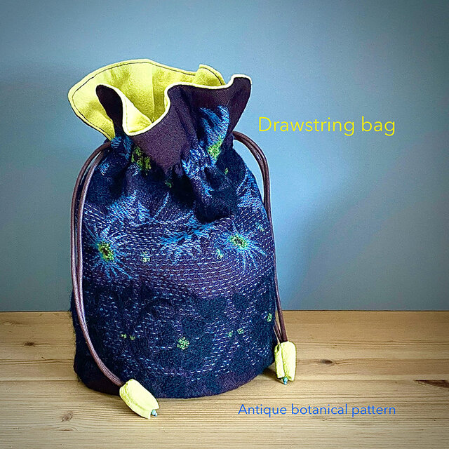 ボタニカル刺繍生地の巾着かばん