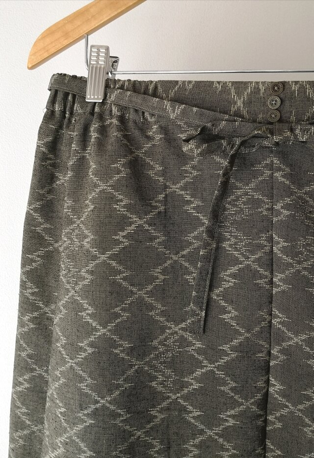 フレアー紬（濃黄緑色松波菱文)