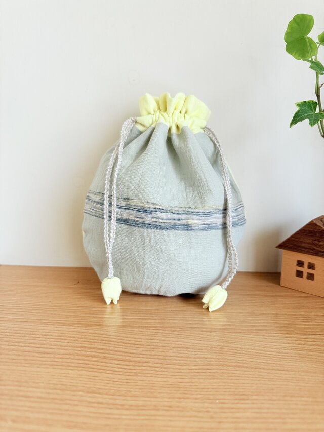 播州織のラウンド巾着袋（クリームイエロー）