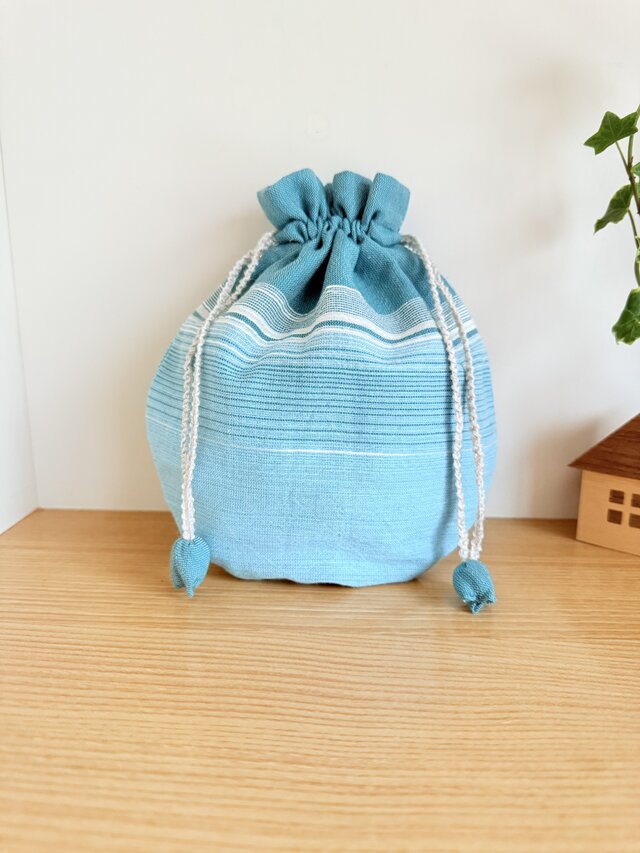 播州織のラウンド巾着袋（青緑）