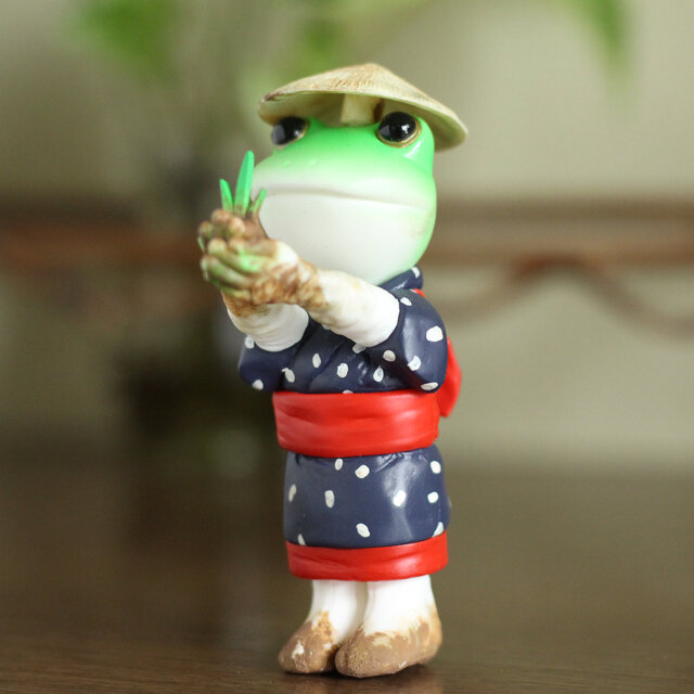 田植えと日本の文化を見守るカエル