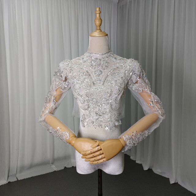 幻想的な輝きトップス ボレロ 長袖 キラキラ光る刺繍 くるみボタン パール 結婚式/披露宴