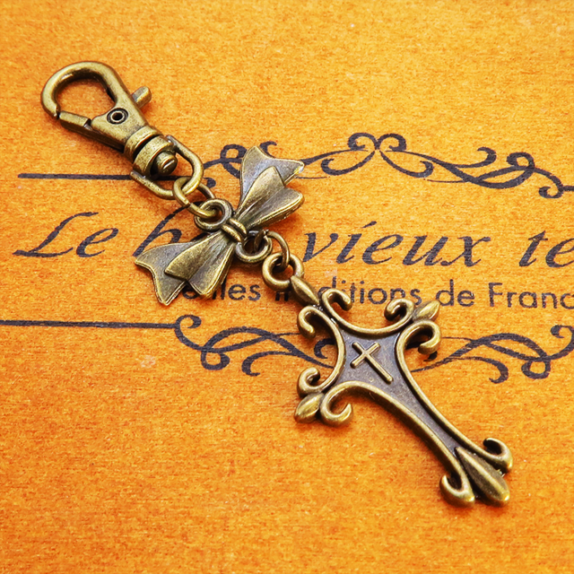 アンティークゴールド ロザリオとリボンのキーホルダー バッグチャーム