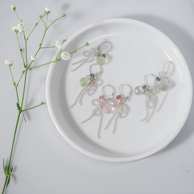 Silver925 極上カット ローズクォーツのリボンソフトタッチイヤリング