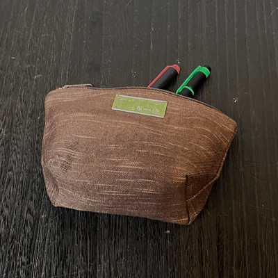 柿渋染め絣ポーチ小 K26009 | iichi 日々の暮らしを心地よくする